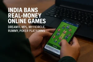 India Bans Real-Money Online Games: Dream11, MPL, My11Circle Among Apps Affected — A person holding a smartphone displaying a fantasy cricket team lineup, with bold text overlay announcing the government ban on real-money gaming apps in India.